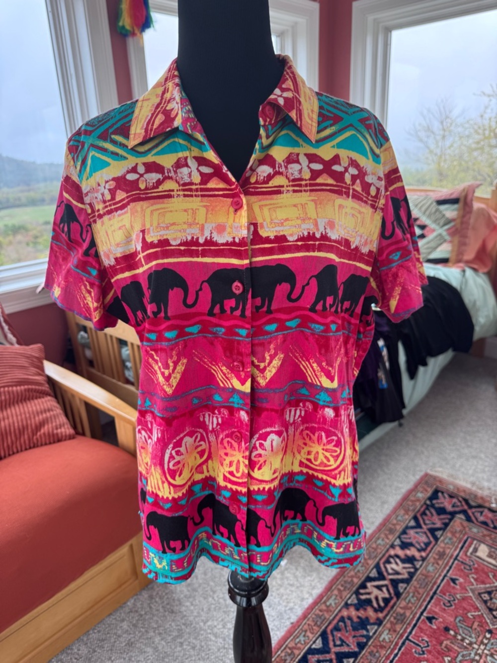 Turquoise and Magenta African elephant design top. Chicos size 2